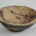 hand built bowl with original poetry, fired in a pit