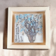 a ceramic artwork with poetry, in a frame